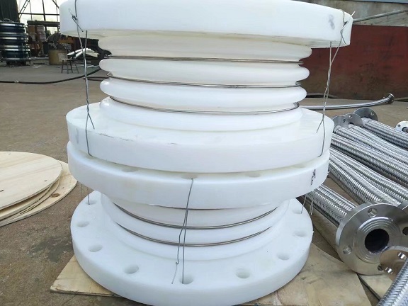 PTFE expansion joints with PTFE flanges